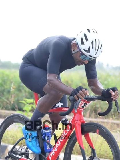 An elite rider on a stunning Pinarello Dogma, a bike built for speed and performance.