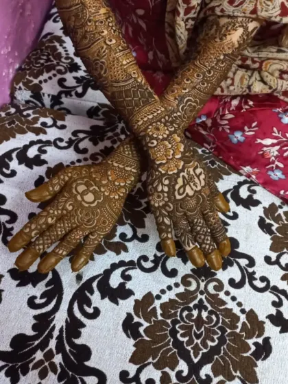 A lovely dark stain from a full hand bridal mehandi. The intricate patterns are still sharp and clear after the paste has been removed, showing how well the color has absorbed into the skin.