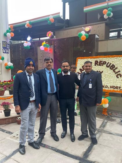 A photo with court staff during the Republic Day event. We are all part of one large family working towards justice.
