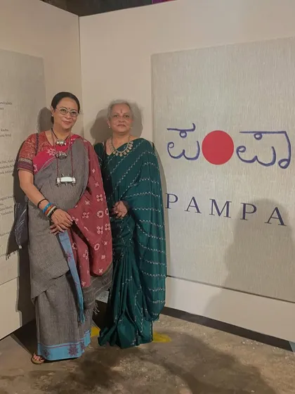 With a fellow textile lover at the Pampa exhibition. Events like these are vital for celebrating and promoting our state's rich craft traditions.