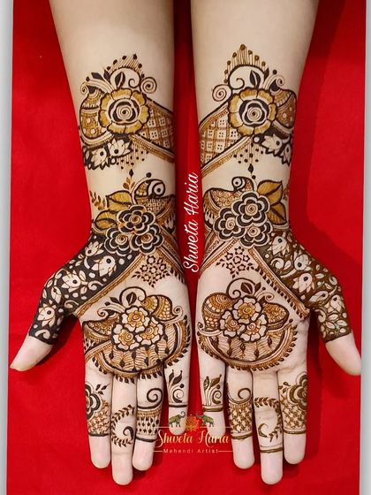 A bright and beautiful floral design using a dual-tone effect to make the flowers pop, perfect for a sangeet or mehendi party.