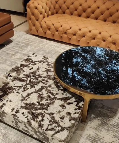 A close-up of the coffee table set, showcasing the beautiful natural patterns of the stone and our ability to work with heavy, luxurious materials.
