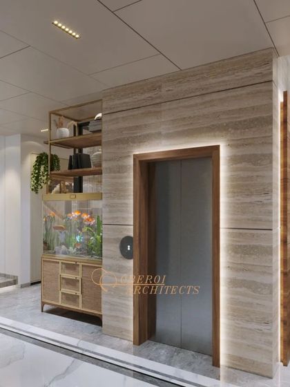 A seamless blend of natural textures and modern functionality. The elevator is clad in travertine marble with integrated lighting, turning a utility feature into a design statement.