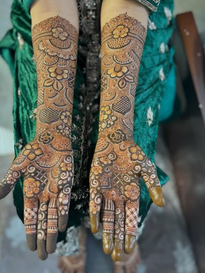 Another angle of the non-bridal full-arm mehendi, showcasing the consistency and neatness of the work.