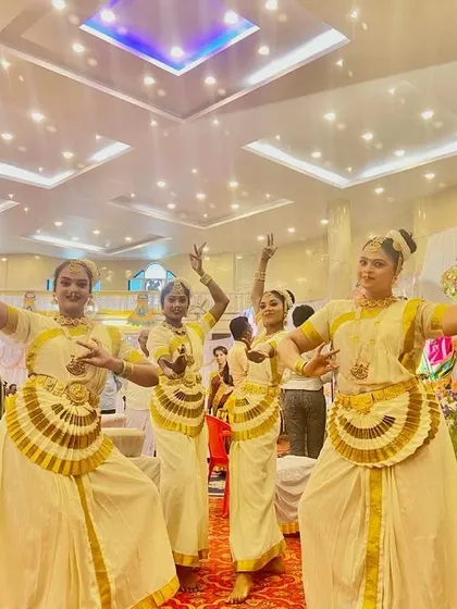 We arrange for captivating entertainment, like this traditional Mohiniyattam dance troupe, to add a touch of cultural elegance and live performance art to your social event.