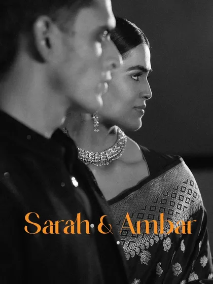 An artistic, black and white portrait of a couple. The side profile and dramatic lighting give this shot a very chic, editorial, and timeless feel, perfect for a couple who appreciates fine art.