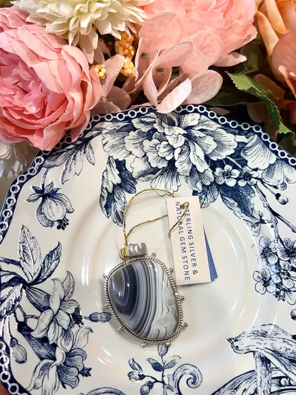 When tea-time treats shine a little brighter with sterling silver. This beautiful natural gemstone pendant is a perfect example of everyday elegance.