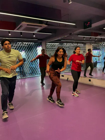 A candid shot from our "Let's Nacho" session. You can see the movement and energy as we dance our way to fitness.
