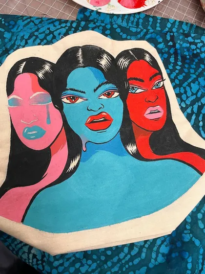 The pillow's front panel during the painting process, before it was sewn and stuffed.