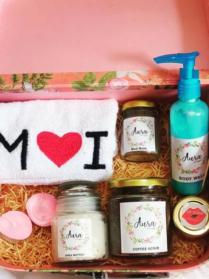 How cute is this spa hamper for a wedding anniversary? It comes in a lovely floral trunk box and includes a custom 'M ❤️ I' towel, coffee scrub, Shea butter, body wash, and more.