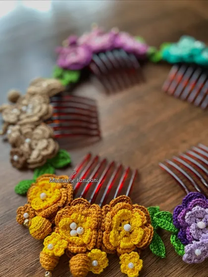 A circular arrangement of our colorful crochet bun combs. This shows the range of colors we offer, from sunny yellow to deep purple, all handcrafted with love.