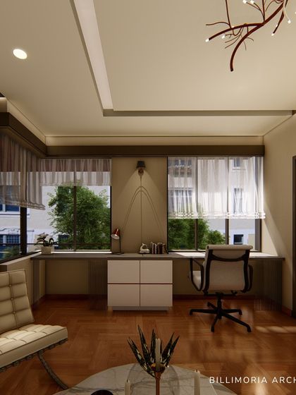 The built-in desk by the window provides a perfect work-from-home spot with plenty of natural light. The design is integrated seamlessly with the rest of the bedroom's neutral and warm aesthetic.