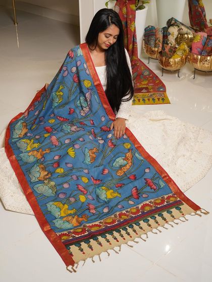 This is a glimpse into my Kalamkari Edition, featuring a wide array of hand-painted dupattas and fabrics from the Indralokam series. Each piece is a unique story, available for you to customize into your dream outfit.