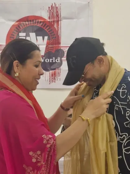 Being honored with a traditional scarf at the "In Art World" event in Kolkata. The warmth and hospitality were wonderful.