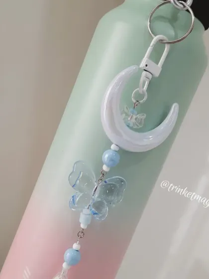 The blue moon and butterfly charm looks just as great on a water bottle. It's a cute and practical way to make sure you never lose track of your bottle.