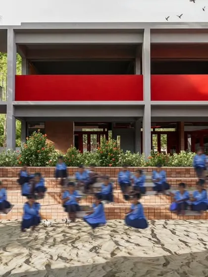 The tiered brick seating of a rural school we designed in the Mandya district. This feature creates an informal amphitheater, transforming the building's edge into a vibrant threshold for student gatherings and community interaction.