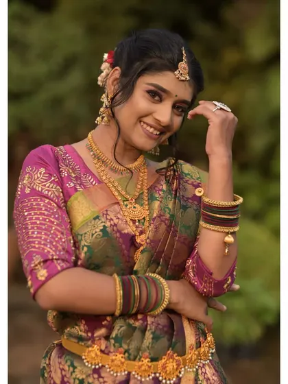 Traditional attire is a culture in itself. This is a beautiful South Indian inspired look, featuring a Kanjeevaram-style saree, temple jewelry, and a radiant makeup finish.