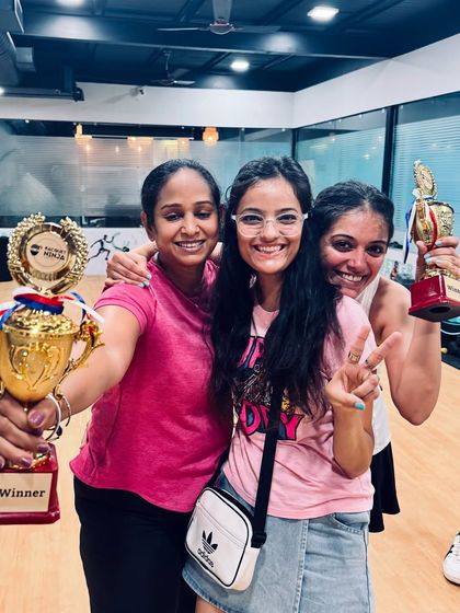 Pure joy and victory. Three players celebrate their win at the Ninja Dojo Duel, showcasing the fun and friendship forged on the court.