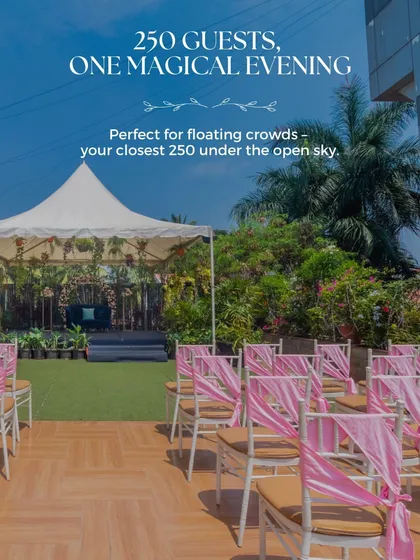 Perfect for a floating crowd of 250 guests, our Terrace Garden offers an intimate setting under the open sky. This daytime view highlights the lush greenery and elegant seating arrangement.