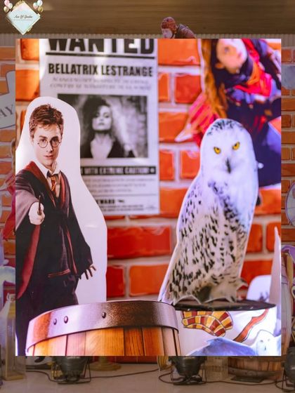 Detailed props like a "Wanted" poster for Bellatrix Lestrange and a life-sized Hedwig cutout add authenticity to the Hogwarts atmosphere.