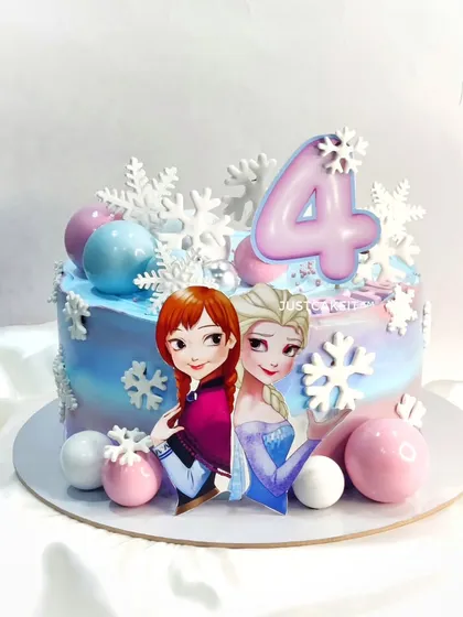 An adorable Elsa and Anna theme cake perfect for a fourth birthday. The cake is decorated with edible snowflakes and chocolate spheres in pastel colors for a magical touch.
