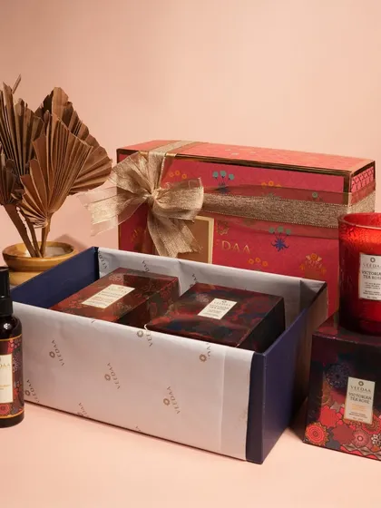This vibrant red-themed gift set is perfect for festive occasions or a romantic gesture. It features a room spray, a glass candle, and other fragrance products, all beautifully packed and ready to delight.