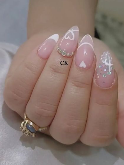 A lovely design for Valentine's Day or any romantic occasion, with hand-painted hearts, glitter, and rhinestone accents.