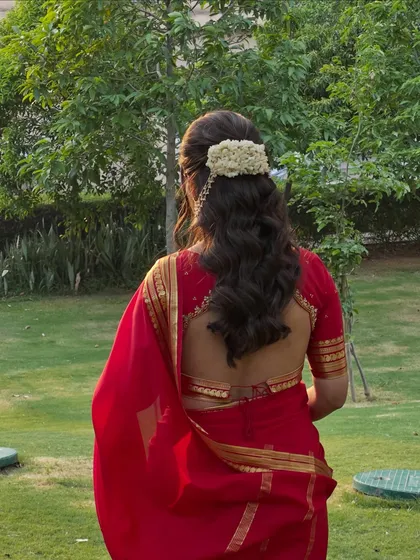 The client walking away, showing the beautiful movement of her hair and the elegance of the style.