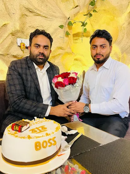 Presenting flowers to my mentor on his birthday. Showing respect and gratitude is important to me.