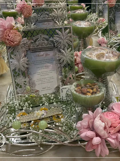 The same elegant hamper design, shown here in a pastel green colorway. I offer customization to match the decor and theme of any wedding, ensuring a cohesive and sophisticated look.