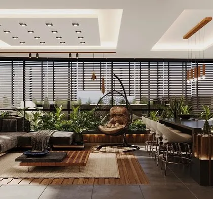 A complete view of a terrace sunroom designed with an integrated living and dining area. The space includes a modern kitchen, a comfortable lounge, and a hanging swing chair, all surrounded by large windows and lush planters.