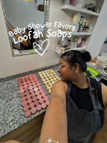 A selfie with the completed order of baby shower loofah soaps. We love creating memorable, handmade party favors for your special announcements and events.