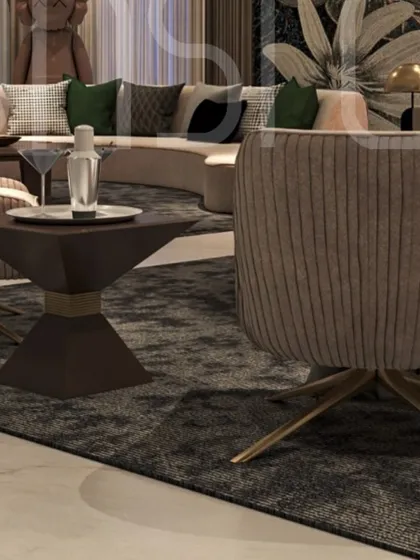 A close-up of the ribbed swivel chairs and geometric side table. The combination of textures and shapes adds a dynamic quality to this luxurious living room.