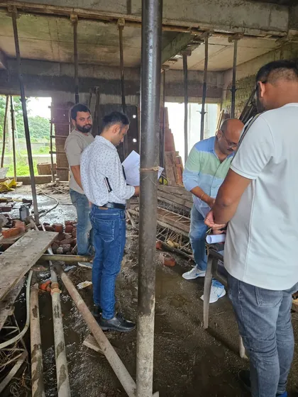 Another angle of our team working at a construction site, ensuring all measurements and placements are as per the Vastu-compliant blueprint.