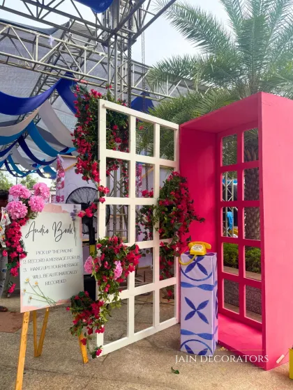 An interactive and fun detail for guests. This audio guest book station, set in a whimsical pink phone booth, allows guests to leave heartfelt messages for the couple in a unique way.