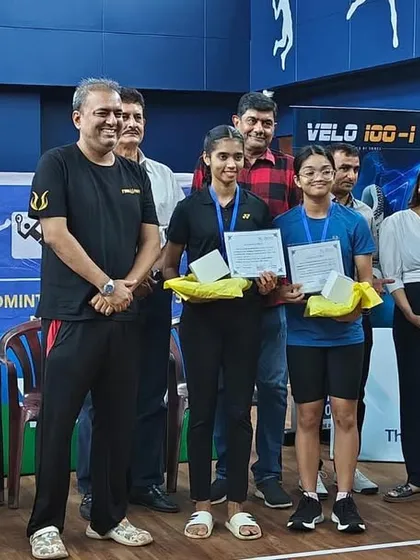 Netra Jhalani and her partner with their silver medals in the Under 17 Girls Doubles Event at the Manora Badminton Academy tournament.