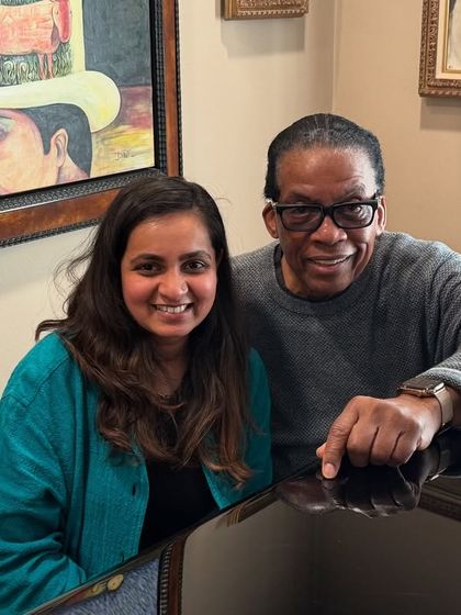 A smiling photo with the master, Herbie Hancock, at his piano. These are the moments that inspire me to keep learning and growing as a musician.