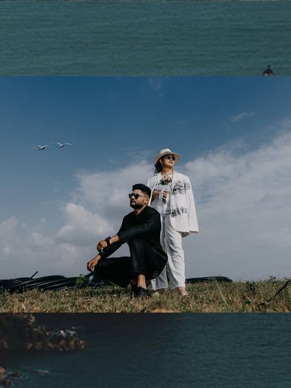 A stylish, modern pre-wedding shoot with an industrial backdrop. The couple's chic outfits and confident poses create a high-fashion look.