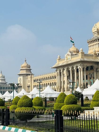 A panoramic view of the event grounds at Vidhan Soudha, showcasing the series of tents we installed for the EV Expo. We can transform open public spaces into fully functional event venues.