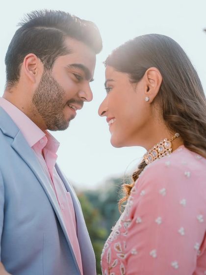 A sun-kissed close-up. The makeup is light and natural, letting her skin glow and her happiness shine through.