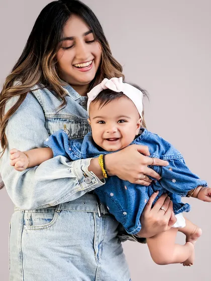 Pure, unrestrained joy between a mother and her baby. My goal is to capture these authentic moments of laughter and love.