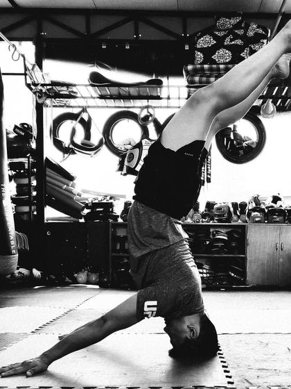 This one-legged headstand variation (Eka Pada Sirsasana) challenges your balance and core stability far more than a standard headstand.