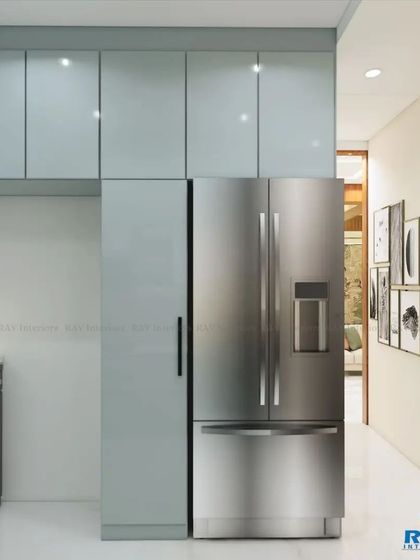 This render shows how we seamlessly integrate a large side-by-side refrigerator into the kitchen cabinetry for a clean and built-in look.