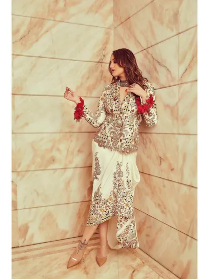 Another angle of the Anamika Khanna ensemble, perfect for making a bold style statement at a wedding or festive event.