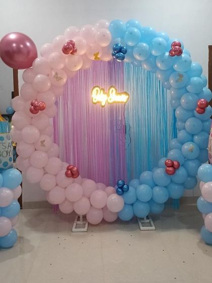 Another view of the pink and blue baby shower ring, perfect for a gender reveal party.