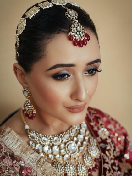 The focus on the eyes in this shot shows the precision of the winged liner and the soft blending underneath. These are fundamental skills for any professional makeup artist.