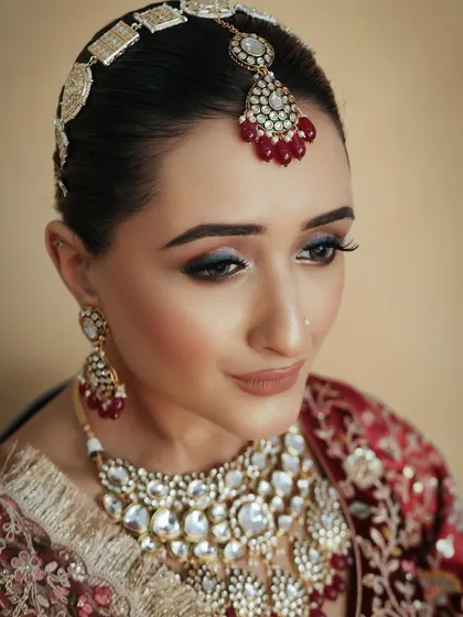 The focus on the eyes in this shot shows the precision of the winged liner and the soft blending underneath. These are fundamental skills for any professional makeup artist.