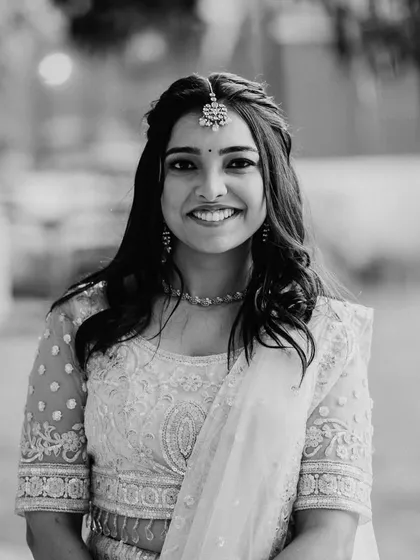 A timeless black and white portrait. It highlights how a well-done natural makeup look can be powerful and striking.