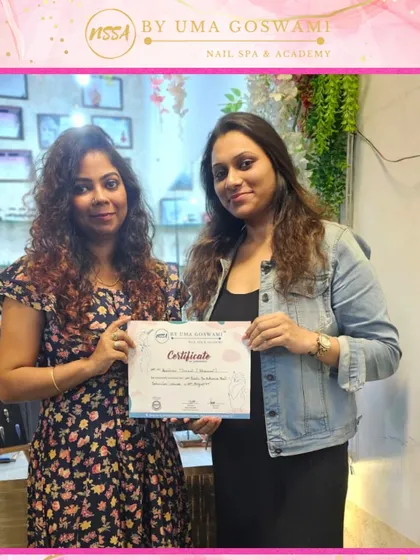 Another successful student, Anushka, with her hard-earned certificate. She is now ready to start her professional journey.