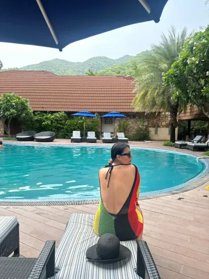 Another view of this colorful, backless swimsuit cover-up. It's all about making a statement, even when you're relaxing.